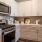 a kitchen with white cabinets