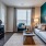 a living room with a couch and chairs
