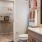 a bathroom with a shower and sink