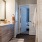 a bathroom with a tub sink and toilet