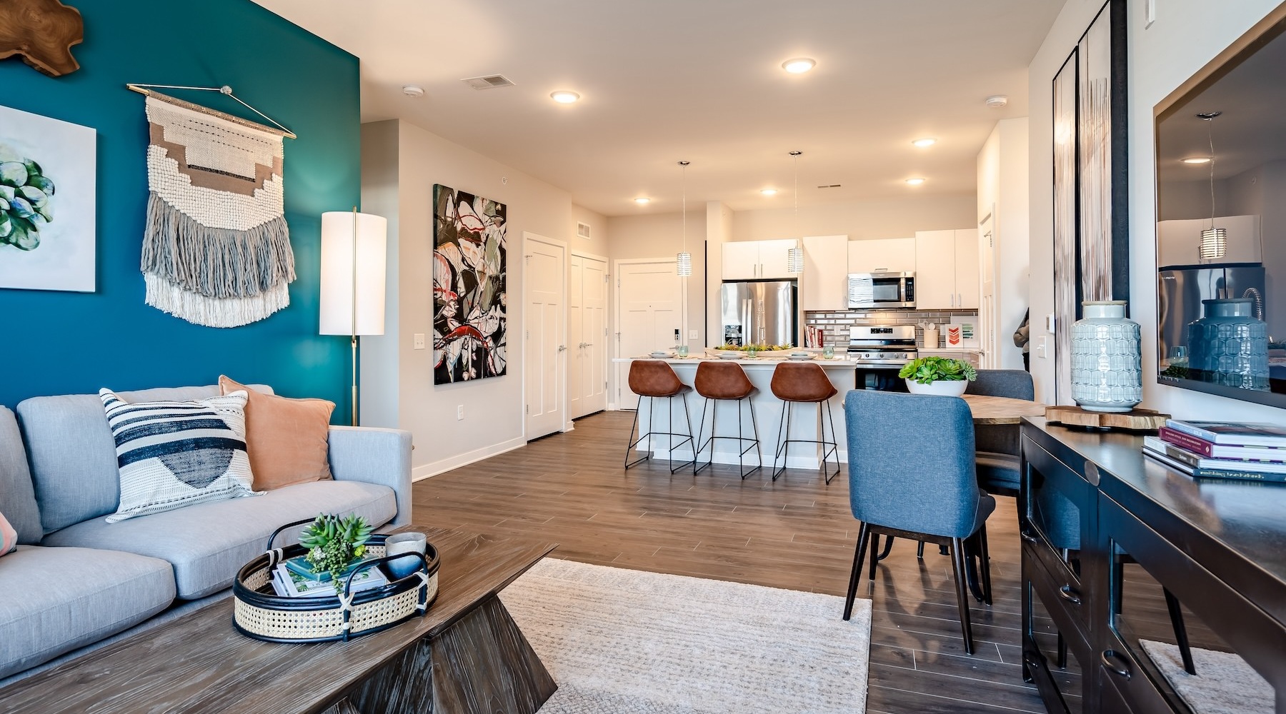 Generous living spaces to relax and unwind living room with couch coffee table and tv