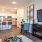 a kitchen with a dining table and chairs