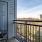 a balcony overlooking a city